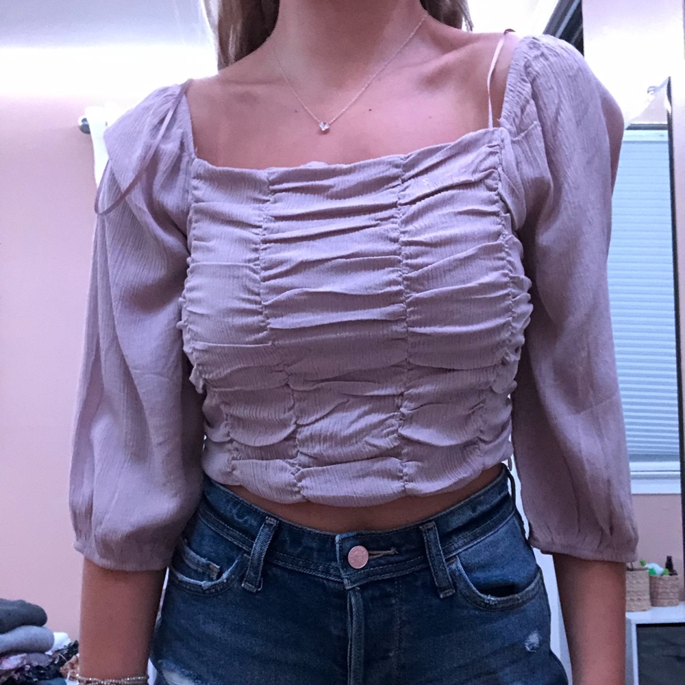Dusty purple blouse.